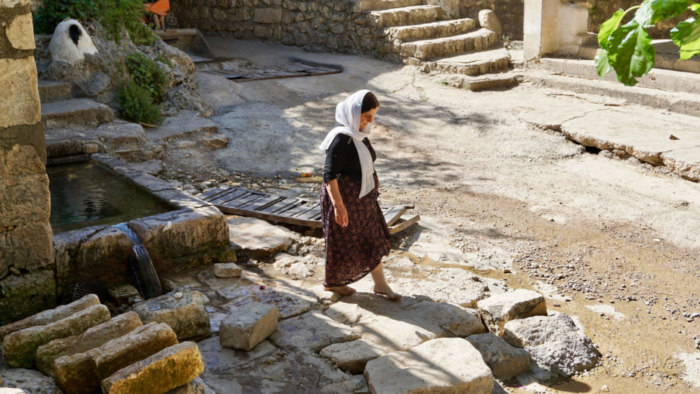 Shoes are forbidden in Lalish, Iraq, even when outdoors, to preserve the sanctuary’s purity.