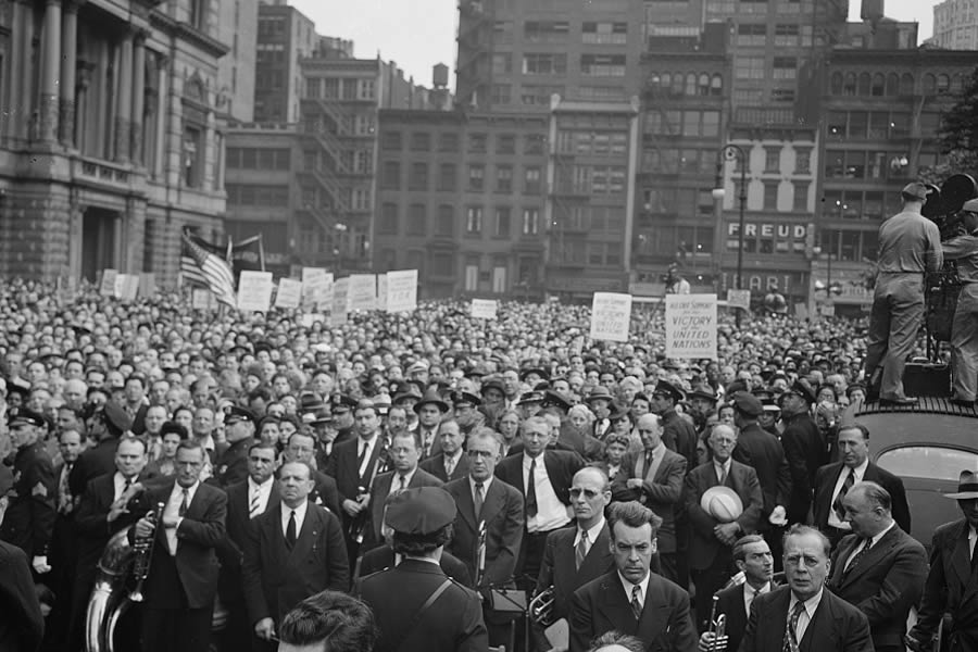 June 6, 1944 — A crowd on D-Day in Madison Square, New York, New York.