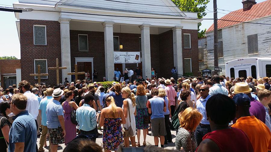 A prayer vigil at Morris Brown African Methodist Episcopal Church. As the church filled to capacity, people gathered outside, sung hymns, and listened to religious leaders talk.