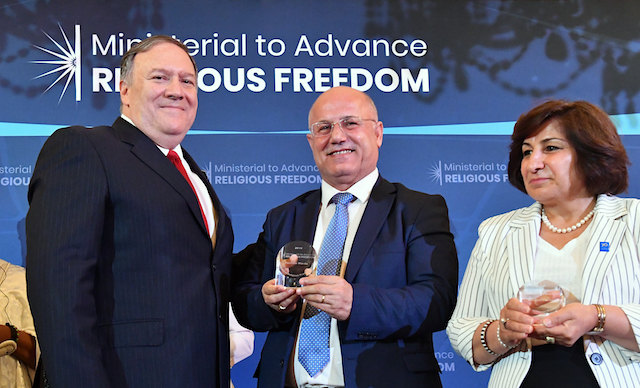 U.S. Secretary of State Michael R. Pompeo poses for a photo with William and Pascale Warda of Iraq at the 2019 International Religious Freedom Awards ceremony at the U.S. Department of State in Washington, D.C., on July 17, 2019. (Michael Gross / State Dept.)