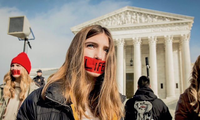 Several women and men stand outside the U.S. Supreme Court in prayer on January 18, 2019 during the 46th annual March for Life. (Photo: Courtesy of Bound4LIFE)