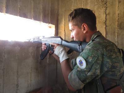 A member of the Syriac Military Council fighting at the Manbij frontline to cut ISIS off from Turkey.