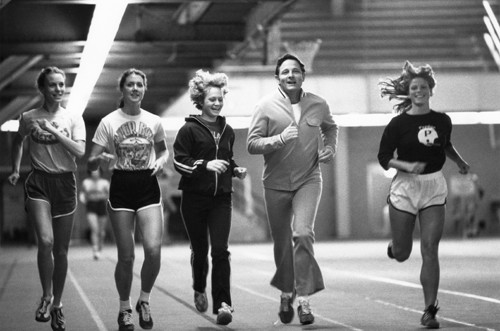Senator Bayh exercises with Title IX athletes at Purdue University, ca. 1970s.